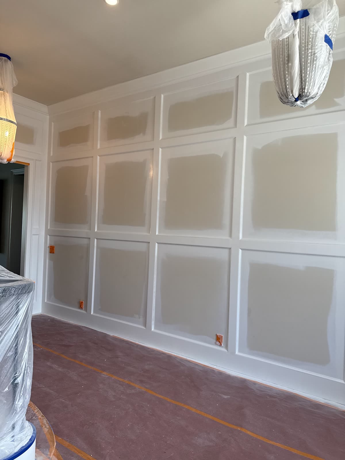 Interior wainscoting wall mid-paint